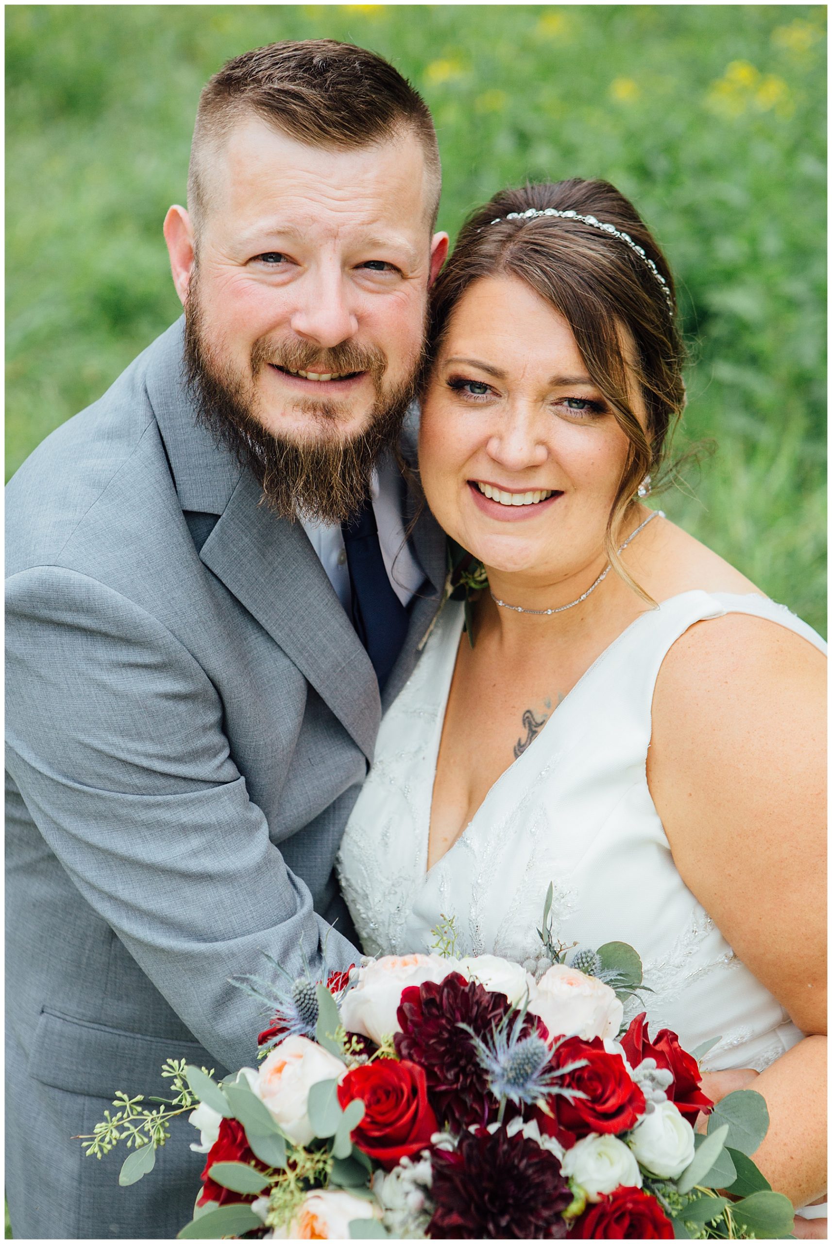 Bride and groom in a field