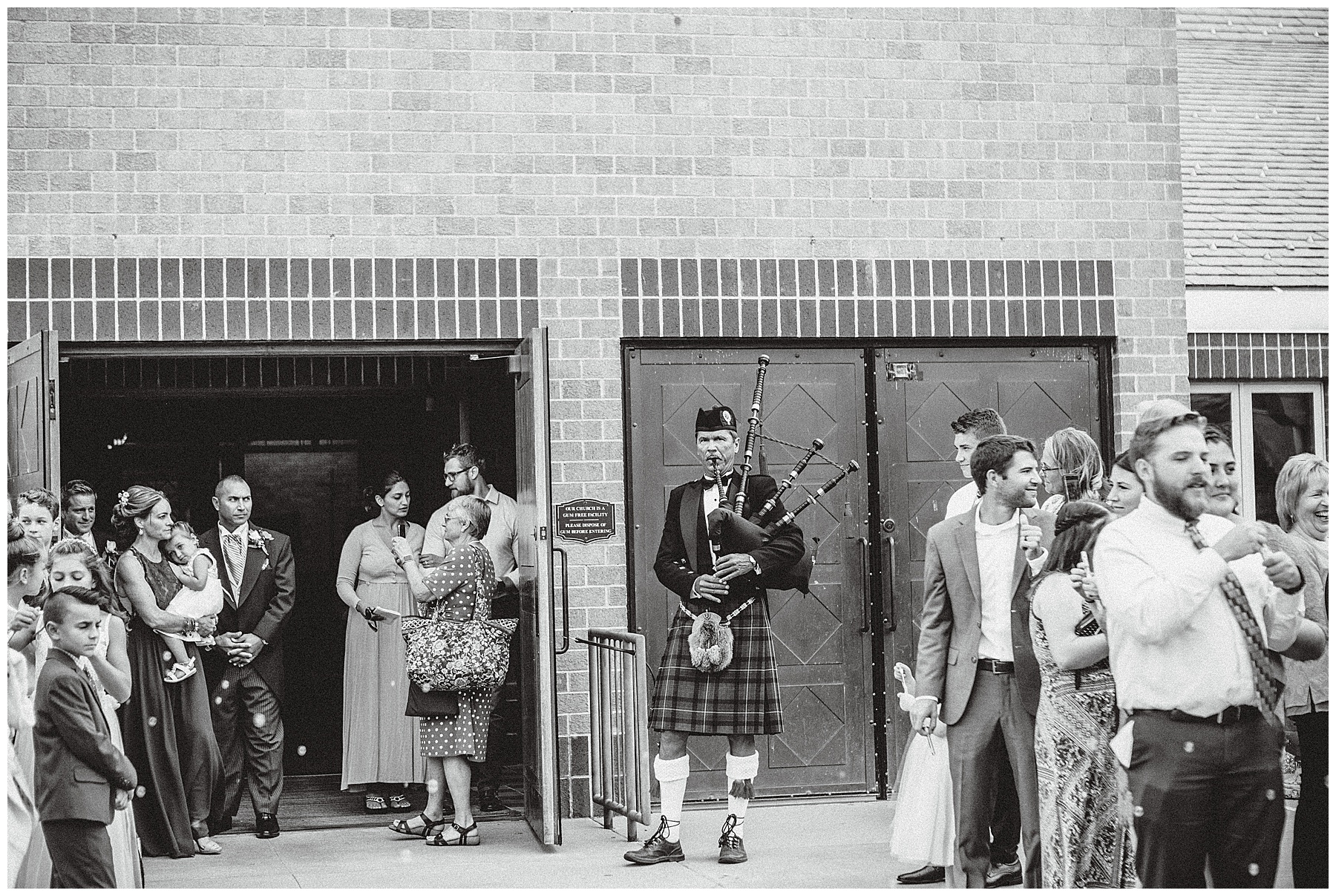 Irishman blowing horn during wedding