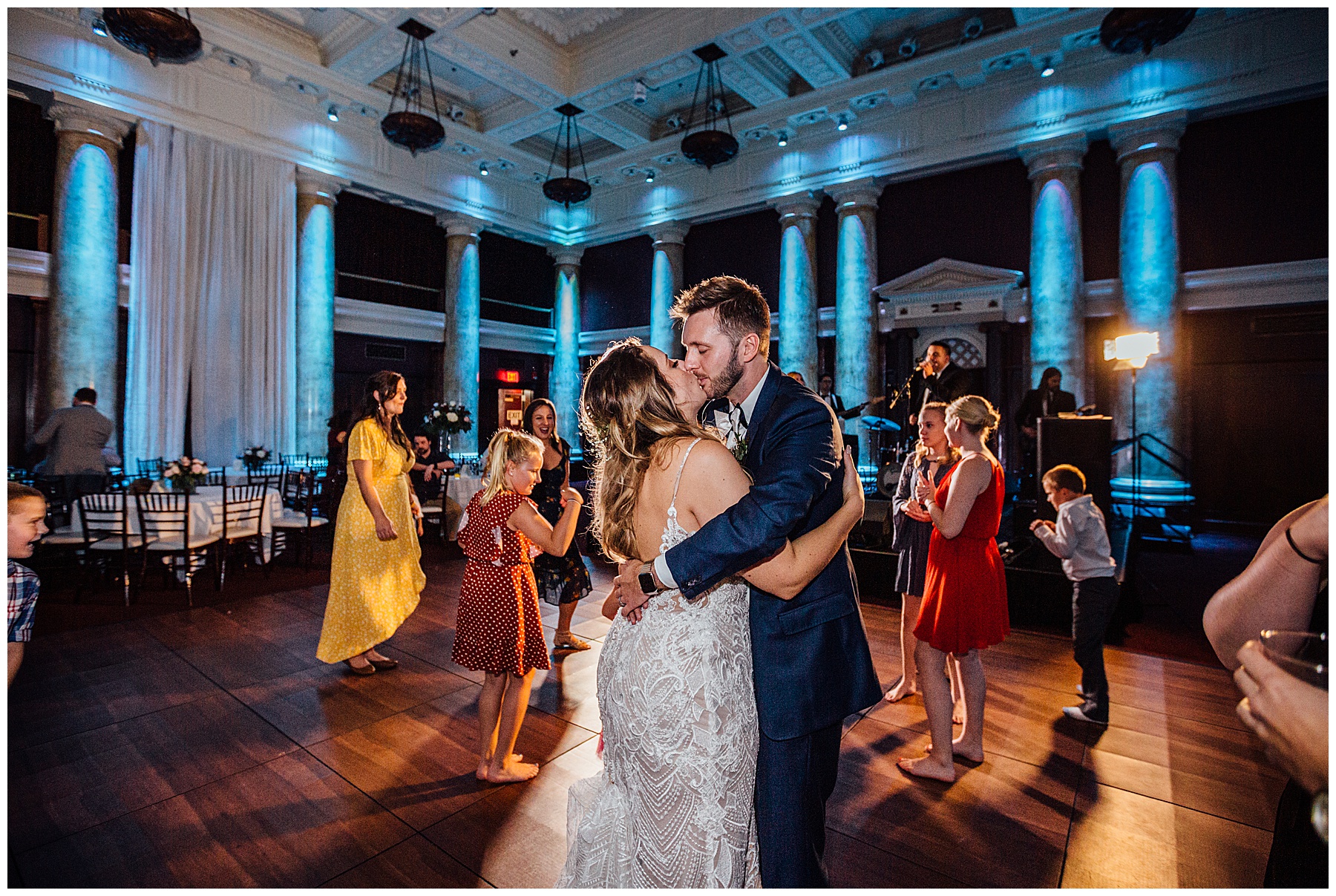 bride and groom dancing with each other 