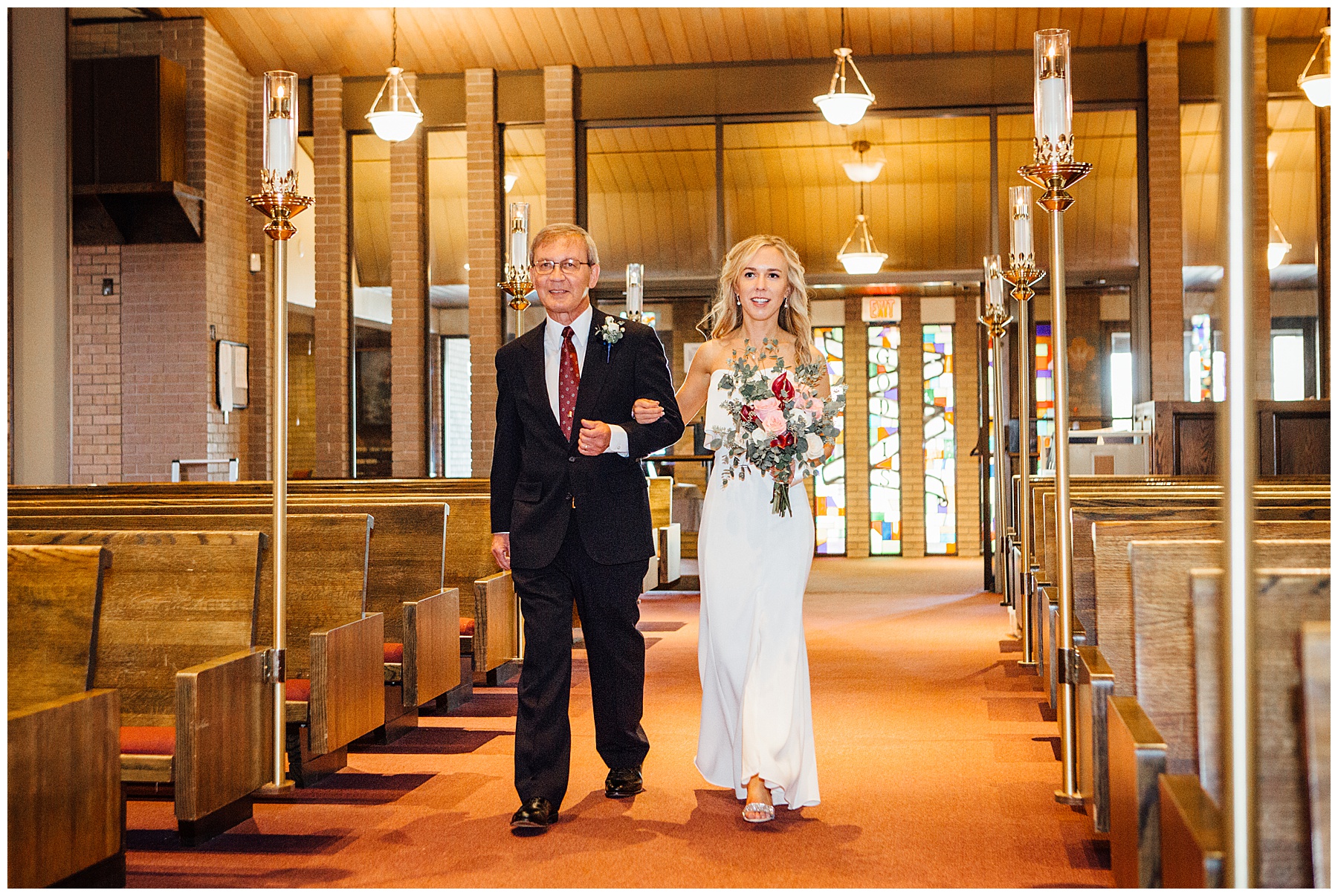 Bride and Father walking down aisle at Lutheran Church of the Master Wedding