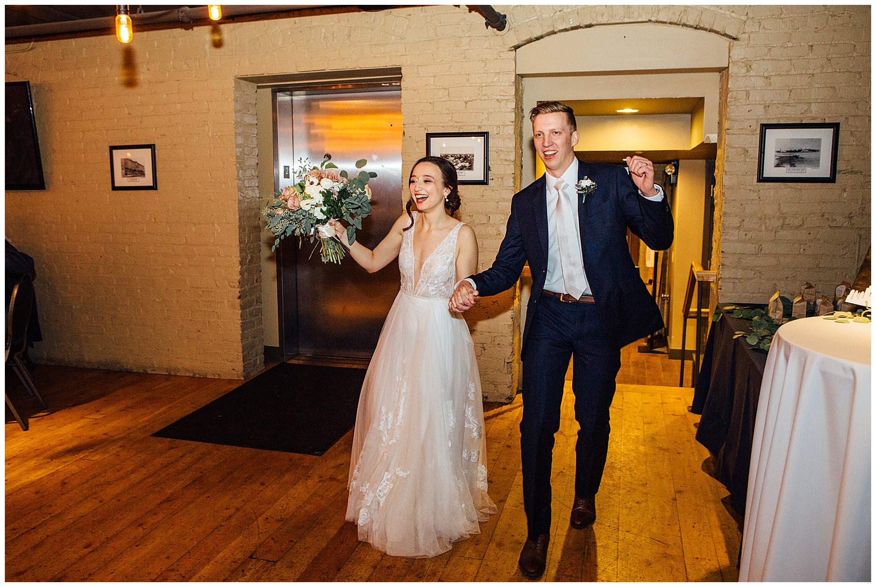 Bride and groom entering Old Mattress factory reception