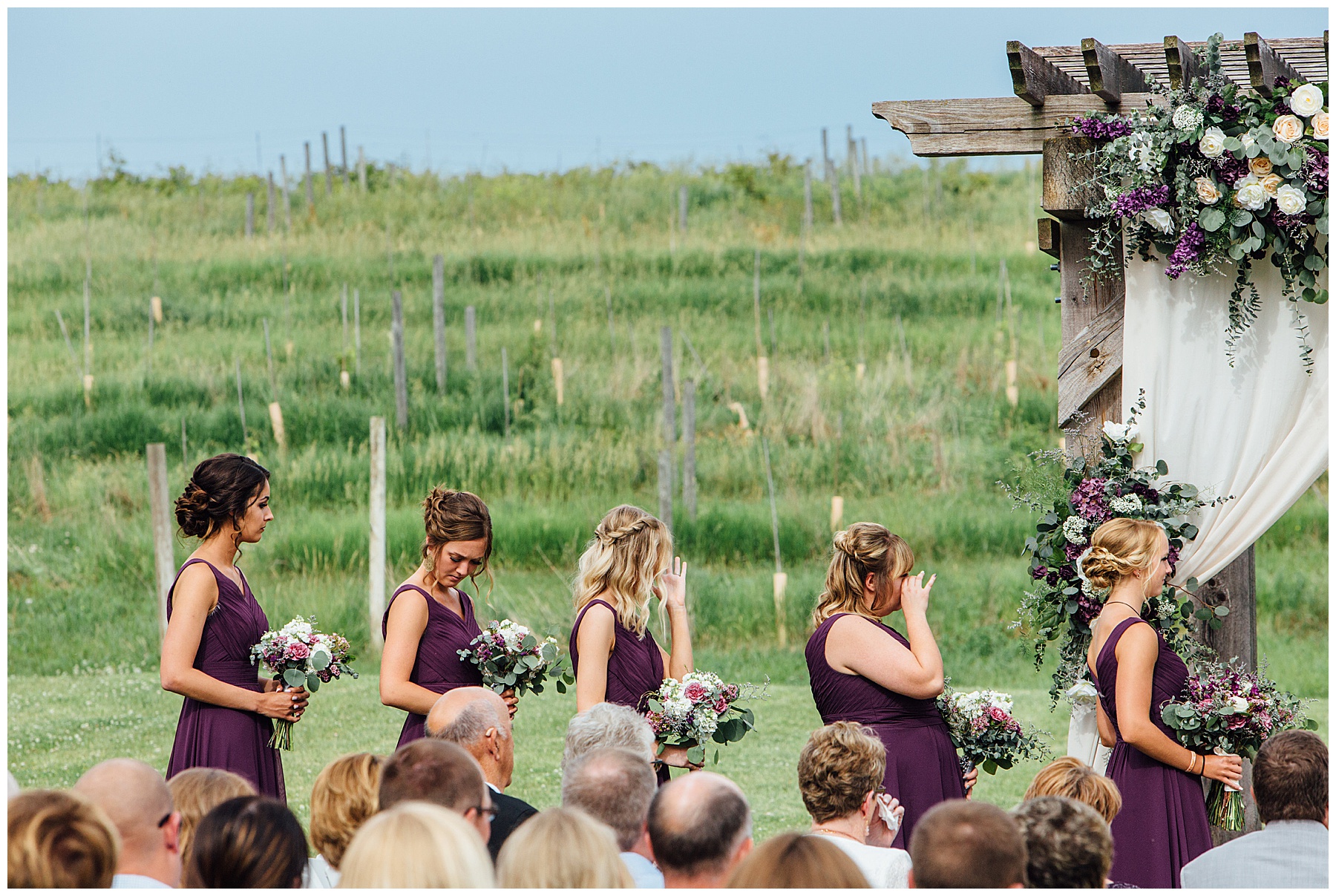 Bridesmaids crying during ceremony