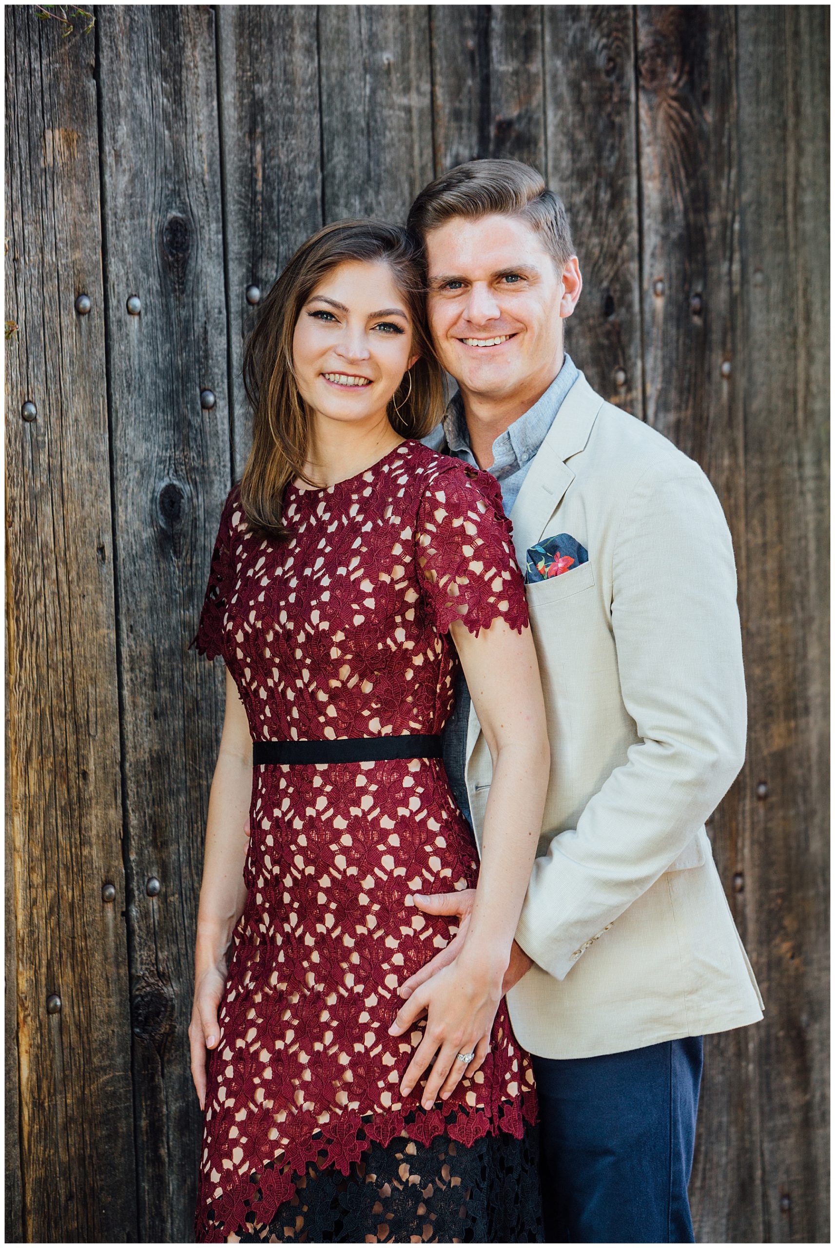 Engagement photo with wood background