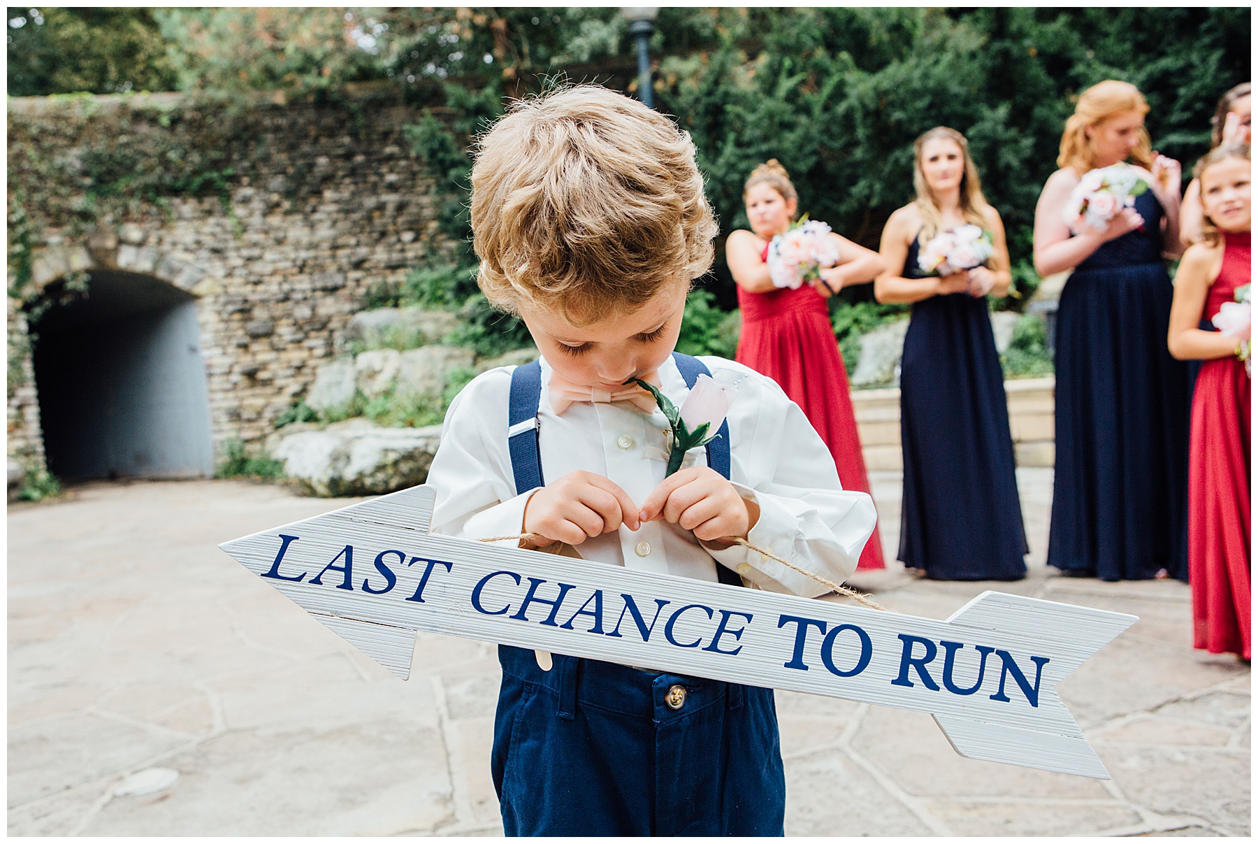 Boy holding sign last chance to run