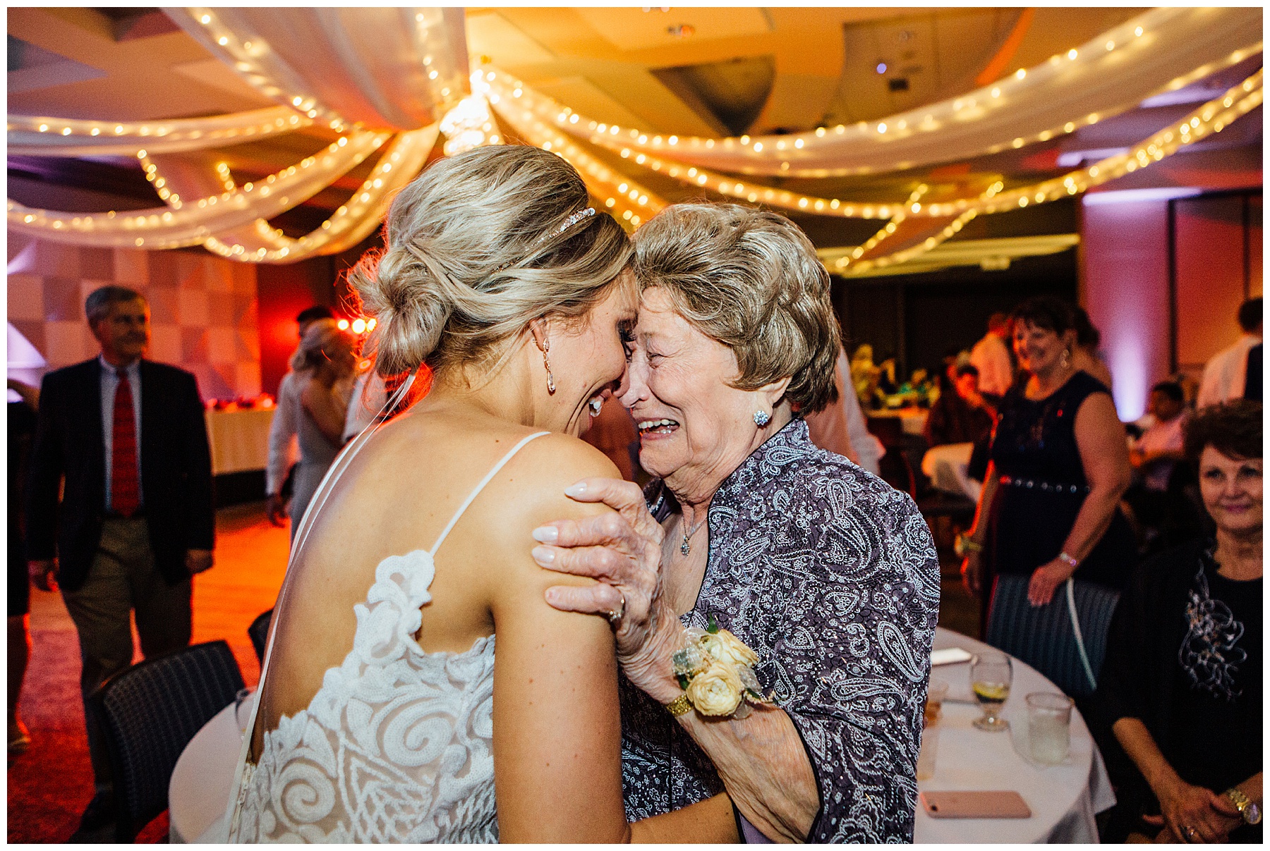 Bride crying with her grandma