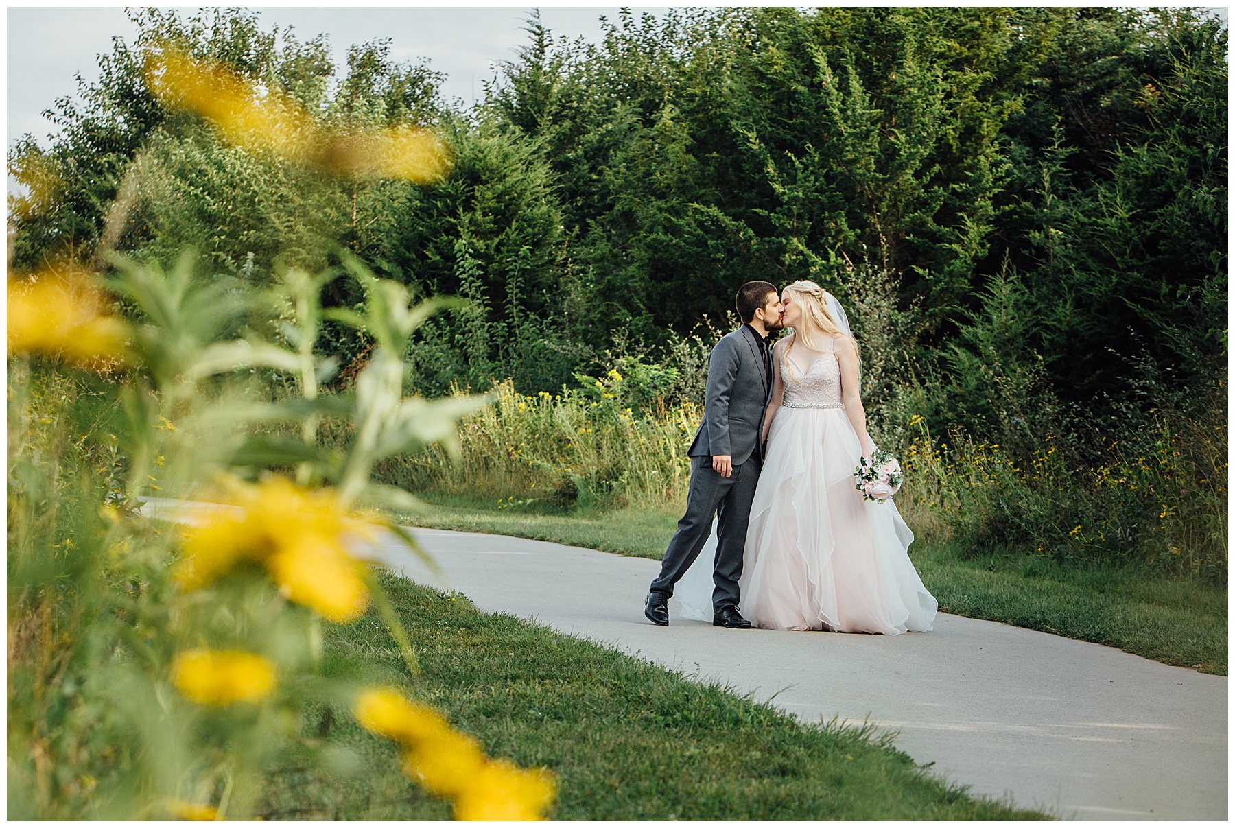 Andrea Bibeault: a wedding photojournalist specializes in real,photojournalistic wedding photography. Based in Omaha,we travel all over the midwest and country.,