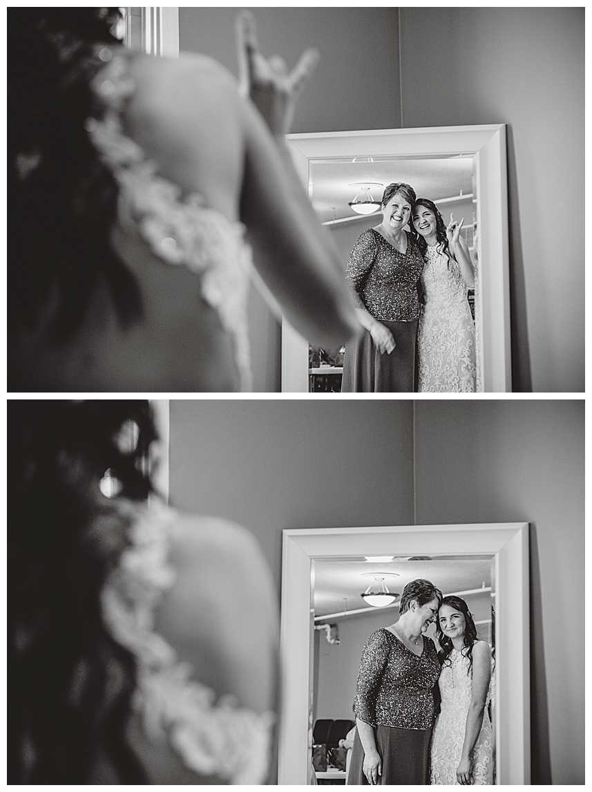Bride with mom looking in mirror