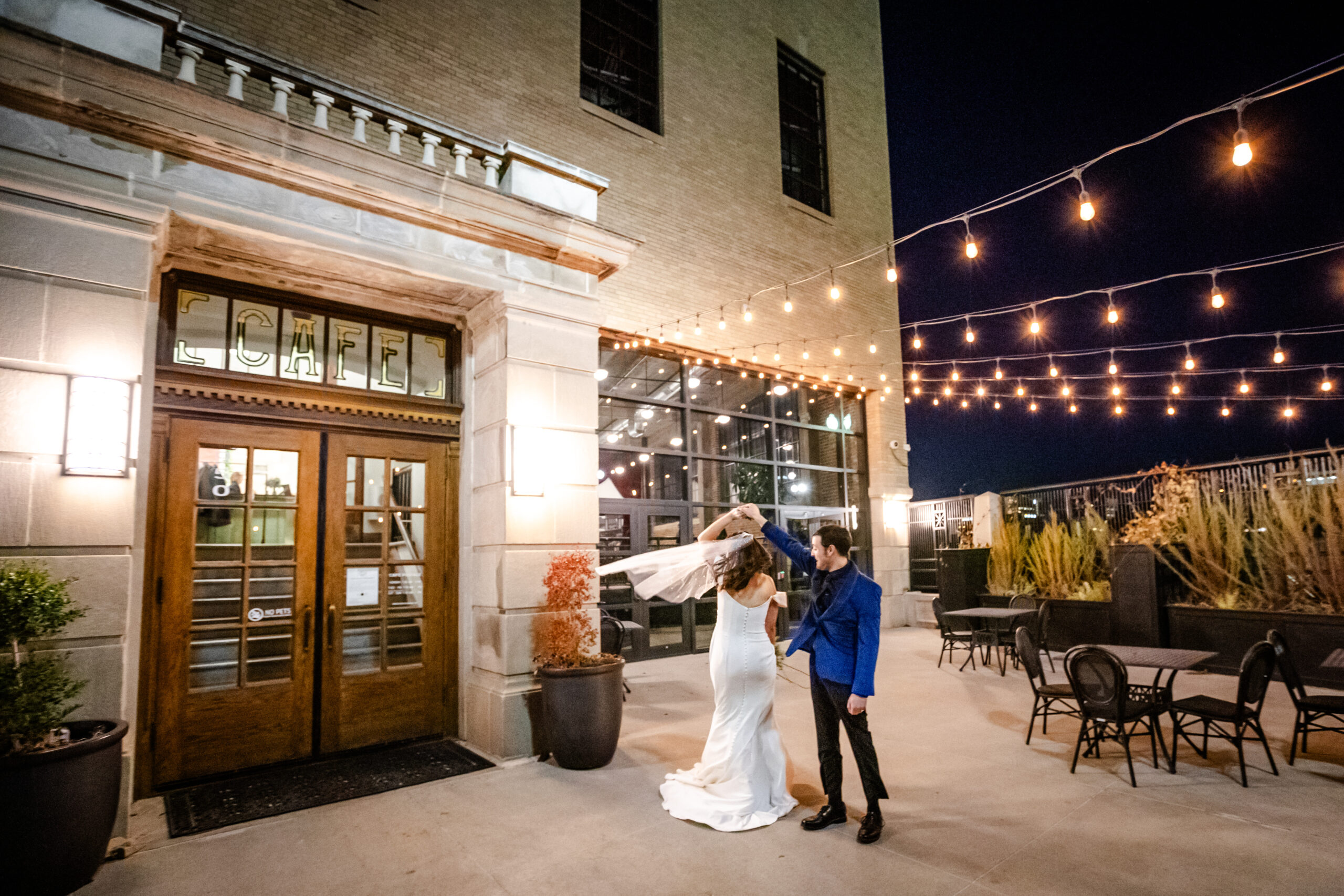 Bride groom dancing at Cafe Postale